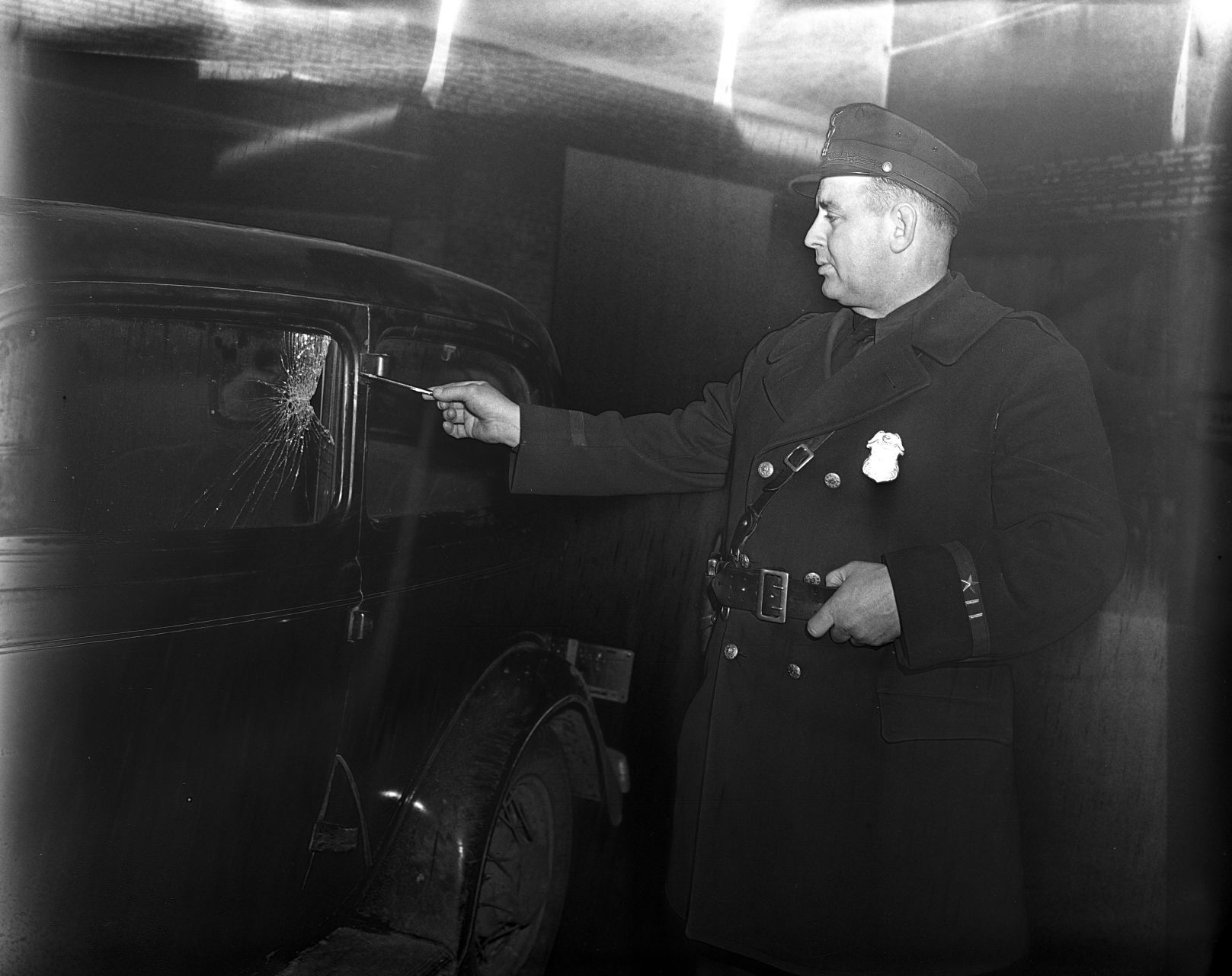 Officer Bruns next to car
